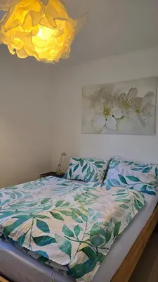 Ein Bett oder Betten in einem Zimmer der Unterkunft The Garden Residence
