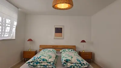 Ein Bett oder Betten in einem Zimmer der Unterkunft The Garden Residence