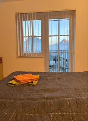 Ein Bett oder Betten in einem Zimmer der Unterkunft Panorama Appartement am Mühlbachberg