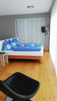 Ein Bett oder Betten in einem Zimmer der Unterkunft Haus Sonnenweg