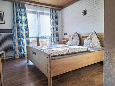 Ein Bett oder Betten in einem Zimmer der Unterkunft Apartment Schwarzenegg by Interhome