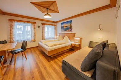Ein Bett oder Betten in einem Zimmer der Unterkunft Ferienwohnung Grabnergang am Wolfgangsee