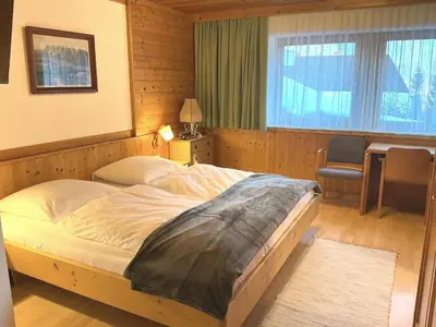 Ein Bett oder Betten in einem Zimmer der Unterkunft Haus Martin Appartement Eichhörnchen