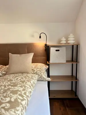 Ein Bett oder Betten in einem Zimmer der Unterkunft Apartment Regenfelder