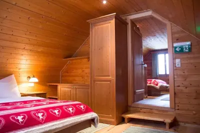Ein Bett oder Betten in einem Zimmer der Unterkunft Ferienhütte Windlegern