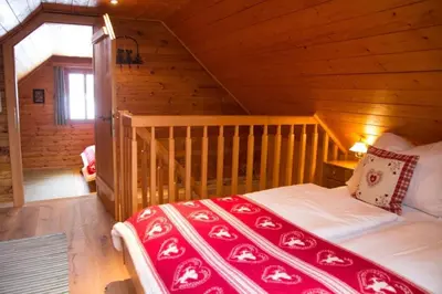 Ein Bett oder Betten in einem Zimmer der Unterkunft Ferienhütte Windlegern