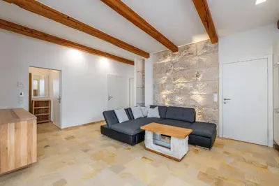 Ein Sitzbereich in der Unterkunft Apartment Höchstein - Stone & Light Residence - by myNests