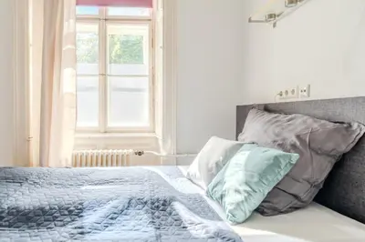 Ein Bett oder Betten in einem Zimmer der Unterkunft Stadtwohnung im Zentrum