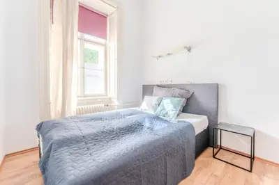 Ein Bett oder Betten in einem Zimmer der Unterkunft Stadtwohnung im Zentrum