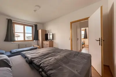 Ein Bett oder Betten in einem Zimmer der Unterkunft Komfortable 2 BR Ferienwohnung direkt in Riegersburg Ruhe & Genuss