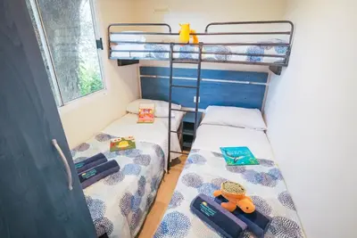 Ein Bett oder Betten in einem Zimmer der Unterkunft Camping Bella Austria - Maeva Vacansoleil