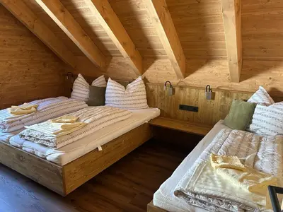 Ein Bett oder Betten in einem Zimmer der Unterkunft Chalet Thomahof