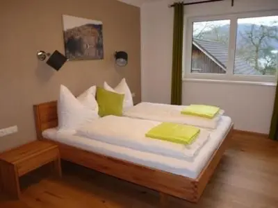 Ein Bett oder Betten in einem Zimmer der Unterkunft Apartment Sonnstein by Interhome