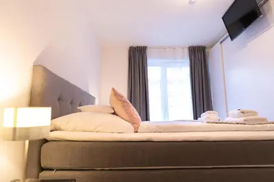 Ein Bett oder Betten in einem Zimmer der Unterkunft Appartement Bergnest 5