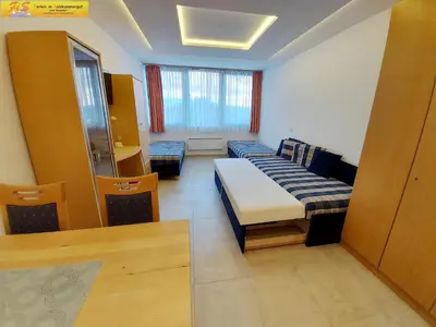 Ein Bett oder Betten in einem Zimmer der Unterkunft Apartment Olivia by FiS - Fun in Styria