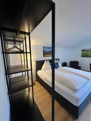 Ein Bett oder Betten in einem Zimmer der Unterkunft Skylofts-Sonnhang