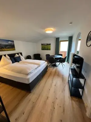 Ein Bett oder Betten in einem Zimmer der Unterkunft Skylofts-Sonnhang