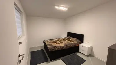 Ein Bett oder Betten in einem Zimmer der Unterkunft Charmantes Ferienhaus in Liezen - Ideal für Erholung & Wintersport