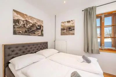 Ein Bett oder Betten in einem Zimmer der Unterkunft Alte Schmiede - by myNests