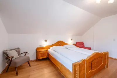 Ein Bett oder Betten in einem Zimmer der Unterkunft Alte Schmiede - by myNests