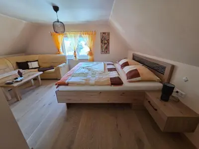 Ein Bett oder Betten in einem Zimmer der Unterkunft Zu-Haus