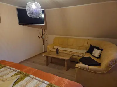 Ein Sitzbereich in der Unterkunft Zu-Haus