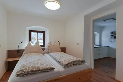 Ein Bett oder Betten in einem Zimmer der Unterkunft Traunreiter Apartment