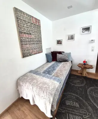 Ein Bett oder Betten in einem Zimmer der Unterkunft NewWorkCenter Apartments