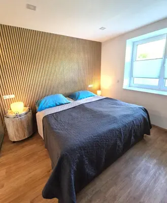 Ein Bett oder Betten in einem Zimmer der Unterkunft NewWorkCenter Apartments