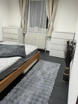 Ein Bett oder Betten in einem Zimmer der Unterkunft Apartment Nojer - Ferienwohnung für 6 nahe Hallstatt & Schladming