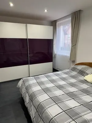 Ein Bett oder Betten in einem Zimmer der Unterkunft Apartment Nojer - Ferienwohnung für 6 nahe Hallstatt & Schladming