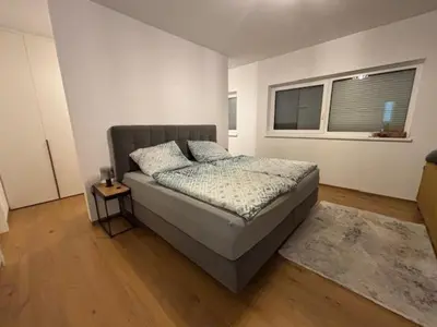 Ein Bett oder Betten in einem Zimmer der Unterkunft Luxus Ferienhaus mit grossem Garten in ruhiger Gegend