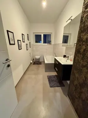 Ein Badezimmer in der Unterkunft Luxus Ferienhaus mit grossem Garten in ruhiger Gegend