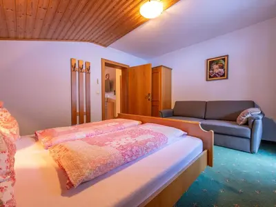 Ein Bett oder Betten in einem Zimmer der Unterkunft Ingrid III