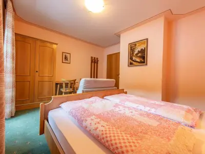 Ein Bett oder Betten in einem Zimmer der Unterkunft Ingrid III