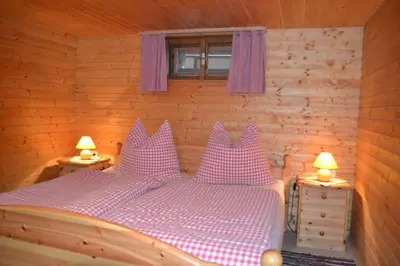 Ein Bett oder Betten in einem Zimmer der Unterkunft Ferienhaus Kammerer