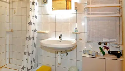 Ein Badezimmer in der Unterkunft Schwammerlhütte