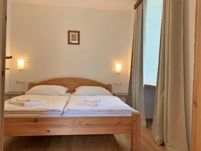 Ein Bett oder Betten in einem Zimmer der Unterkunft Der Ulmenhof