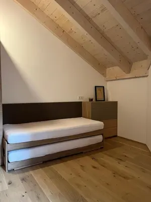 Ein Bett oder Betten in einem Zimmer der Unterkunft The Mountain Nest