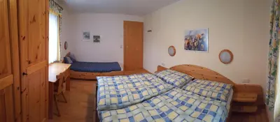 Ein Bett oder Betten in einem Zimmer der Unterkunft Haus Christian