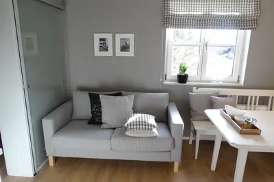 Ein Sitzbereich in der Unterkunft Ferienwohnung Grünwald