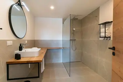 Ein Badezimmer in der Unterkunft Apartments Waldrand - Fink 6 - by myNests