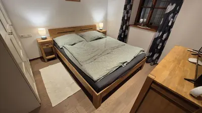 Ein Bett oder Betten in einem Zimmer der Unterkunft Ferienwohnung beim Schnellerbauer