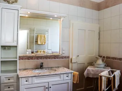 Ein Badezimmer in der Unterkunft Rosenvilla - Musikerschlössl