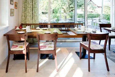 Ein Restaurant oder anderes Speiselokal in der Unterkunft Hotel Garni Carl Michael