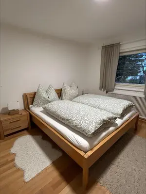 Ein Bett oder Betten in einem Zimmer der Unterkunft Ferienwohnung Wasserfall