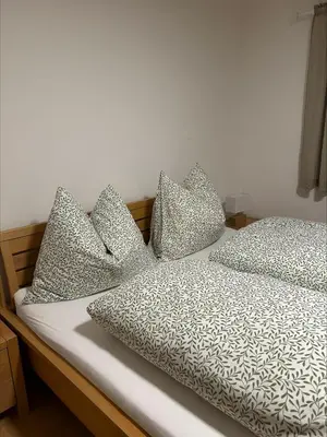 Ein Bett oder Betten in einem Zimmer der Unterkunft Ferienwohnung Wasserfall