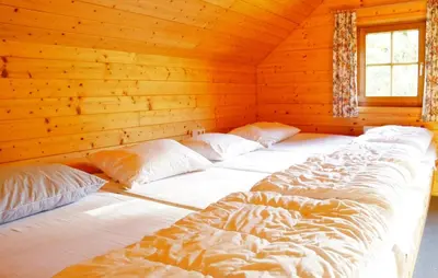 Ein Bett oder Betten in einem Zimmer der Unterkunft Scharlinger Alm in Alleinlage direkt am Hauser Kaibling
