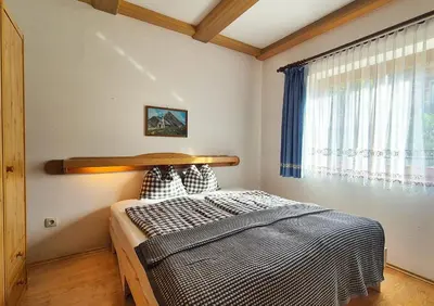 Ein Bett oder Betten in einem Zimmer der Unterkunft Almliesl KRIS-750