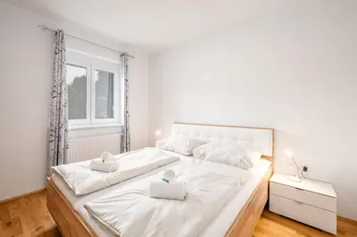 Ein Bett oder Betten in einem Zimmer der Unterkunft Apartment Martina Peaks & Sun - by myNests